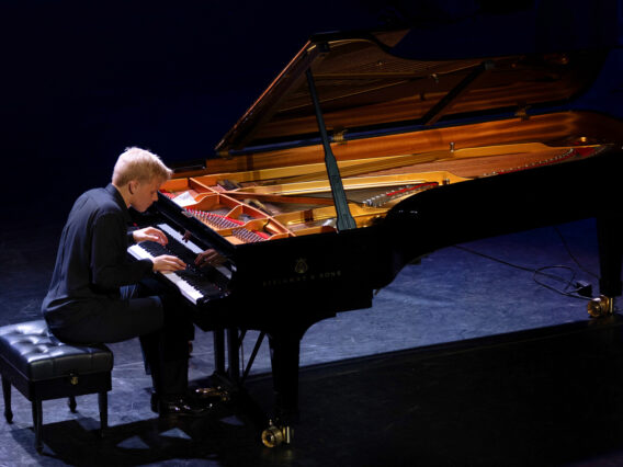 21-year-old piano player wows shoppers at Oxmoor Center's Von Maur, Archive